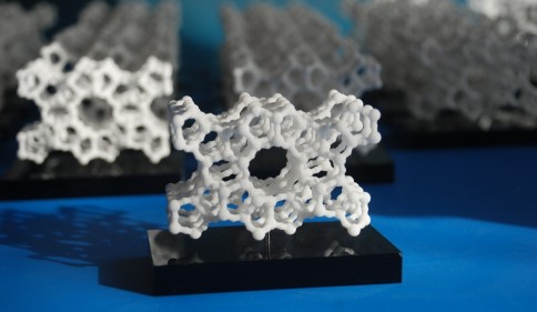 A group of 3d printed zeolite models mounted on perspex bases