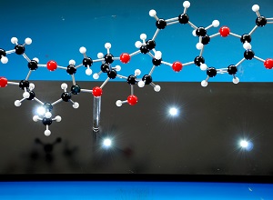 Detail of molecular model with lighting in the base, with the LED lights turned on