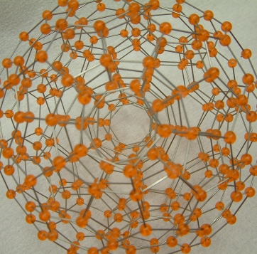 a model of a 533 Polytope made with acrylic balls and steel rods